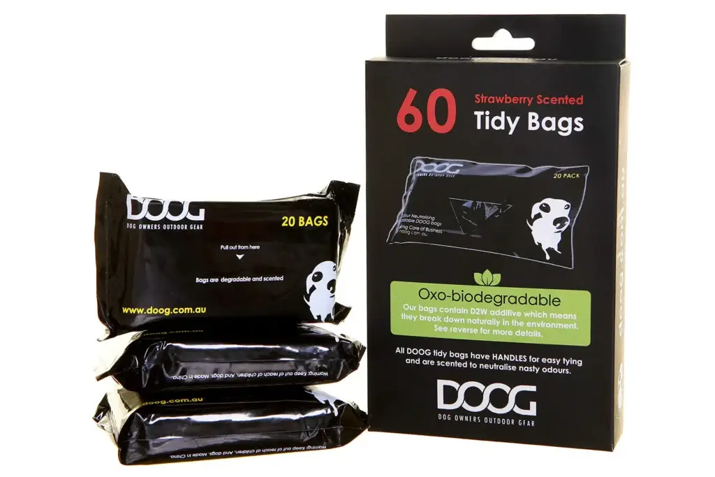 Box of DOOG Biodegradable Strawberry Scented Dog Waste Bags with three packs