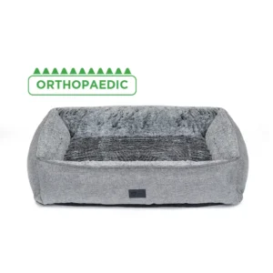 Grey orthopaedic dog lounger with plush interior and bolstered sides