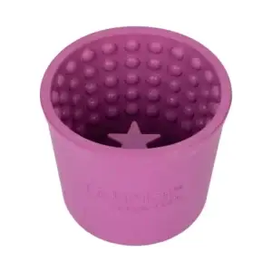 Purple LickiMat Yoggie Pot slow feeder cup with textured interior for dogs.