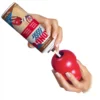 KONG Easy Treat Liver Dog Paste – Application Person filling a red KONG toy with KONG Easy Treat Liver Paste for dogs.
