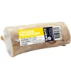 Blackdog Chicken Filled Bone 5 inch side view Wrapped chicken filled beef bone dog treat showing label and filling.