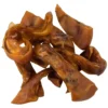 Blackdog Pig Ear Strips Dog Treats – Loose Pieces A pile of natural dried pig ear strip dog treats showing their curved, chewy shape.
