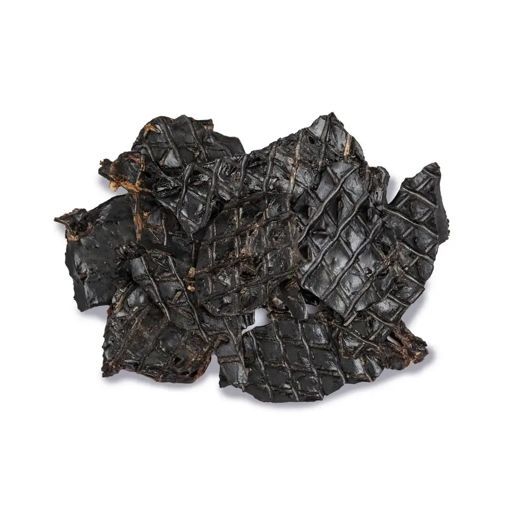 A pile of dried kangaroo liver dog treats with a dark, textured surface.