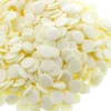 Blackdog Yoghurt Drops Dog Treats – Loose Pieces Large mound of white yoghurt dog treat buttons on a white background.