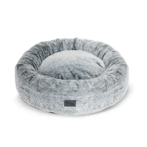 Angled view of the Superior Harley dog bed in arctic faux fur with supportive round shape