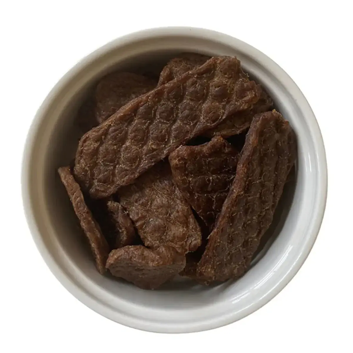 Prime Cut Duck Dog Treats in bowl top view